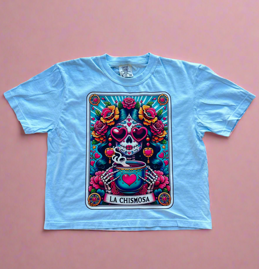 light blue crop top with a colorful la chismosa tarot in the front