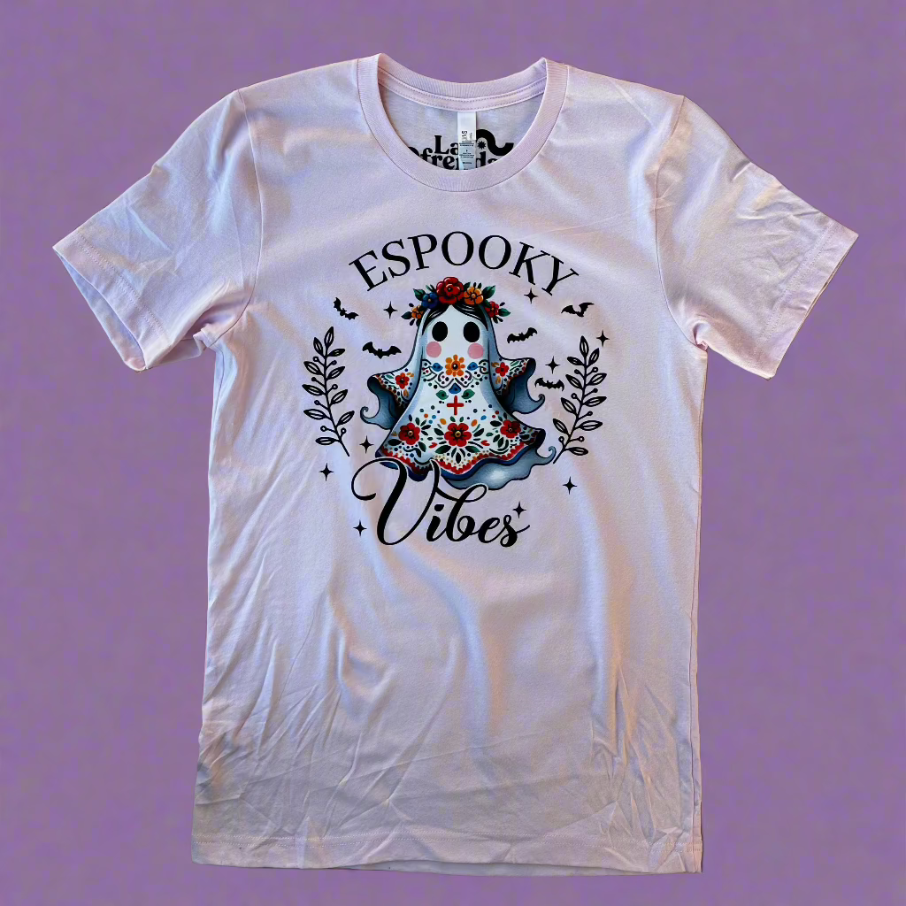 espooky vibe ghost print on a light pink t shirt