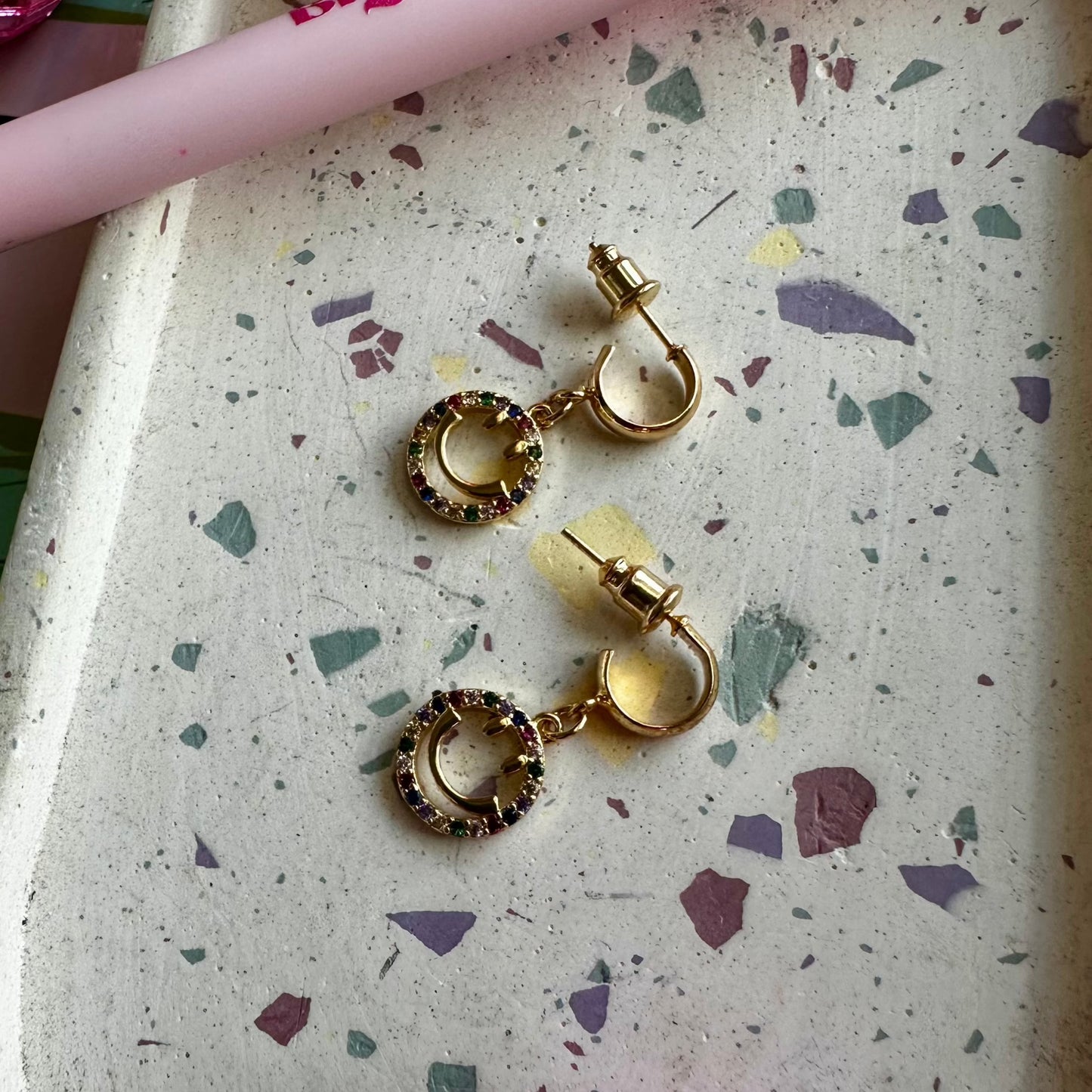 gold huggie hoop multi color pride smiley faces