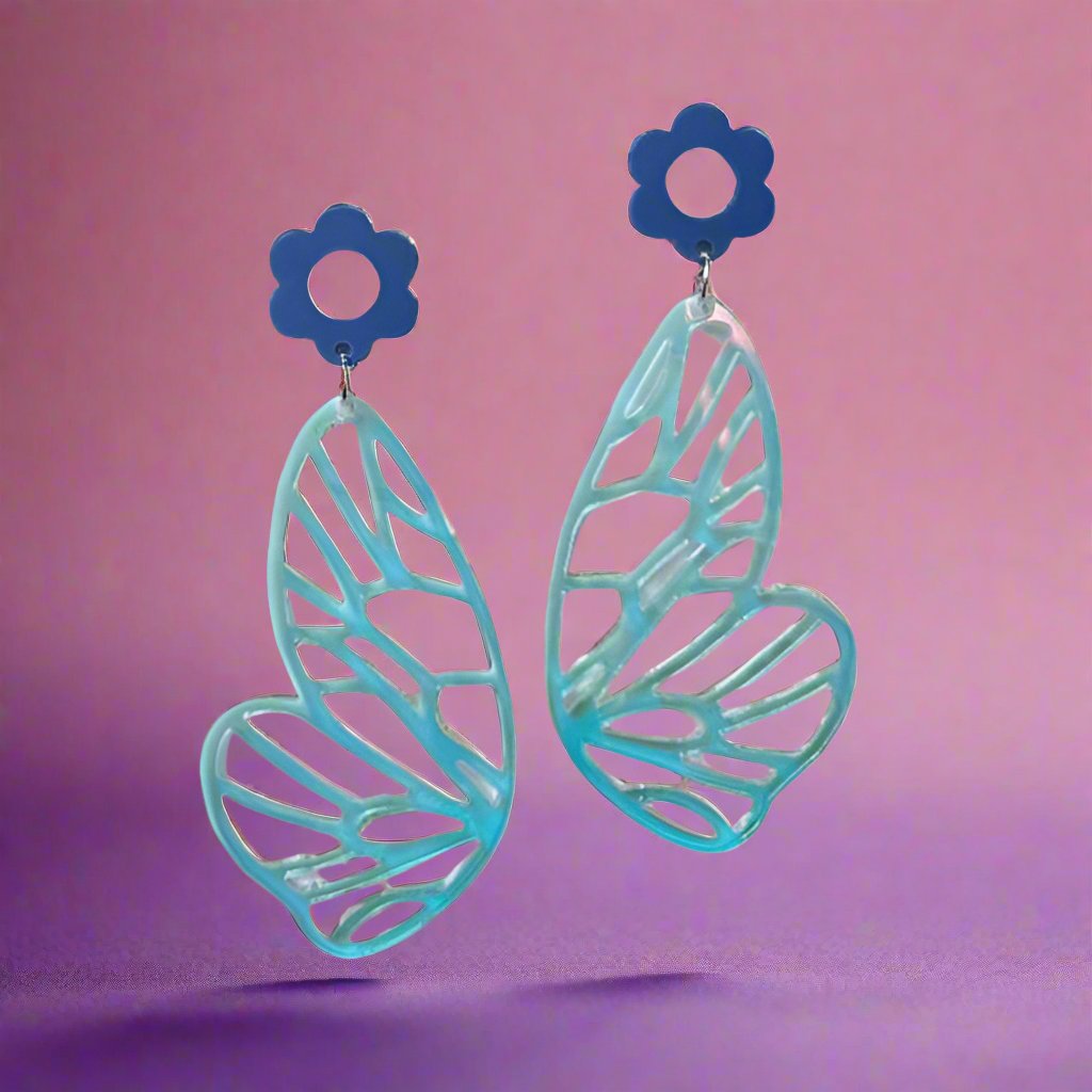 Iridescent butterflies blue flowers and iridescent