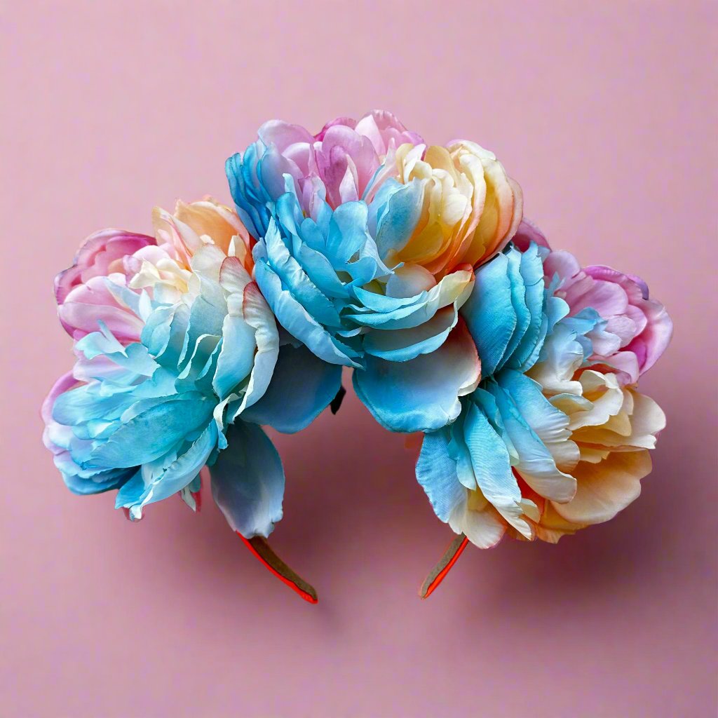 beautiful rainbow flower crown on an orange head band