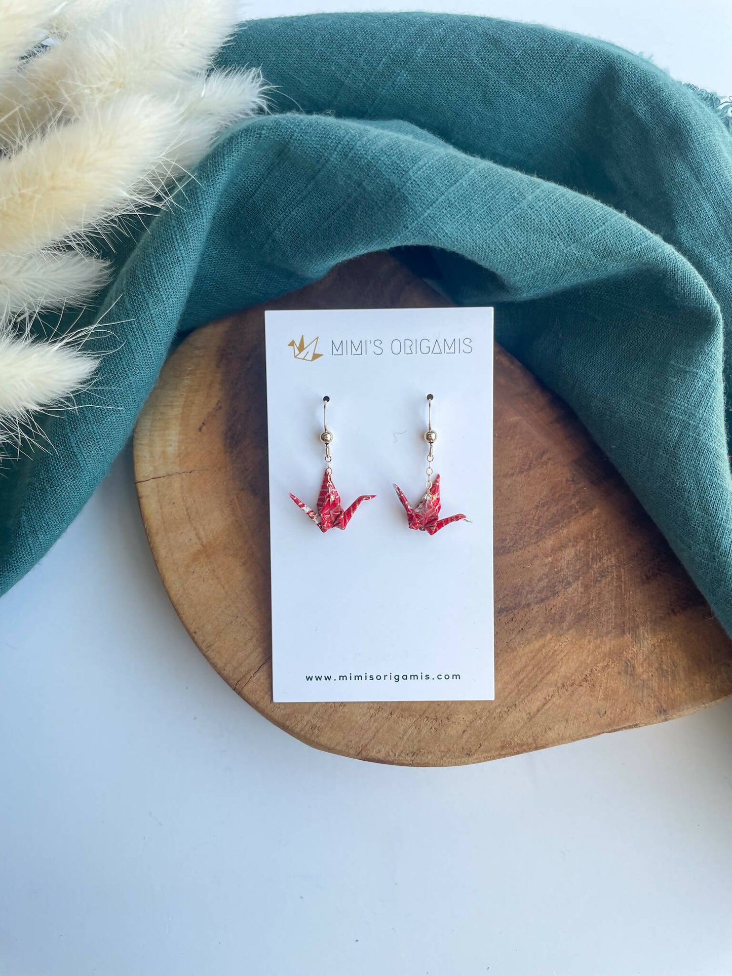 Tiny Dangling Cranes