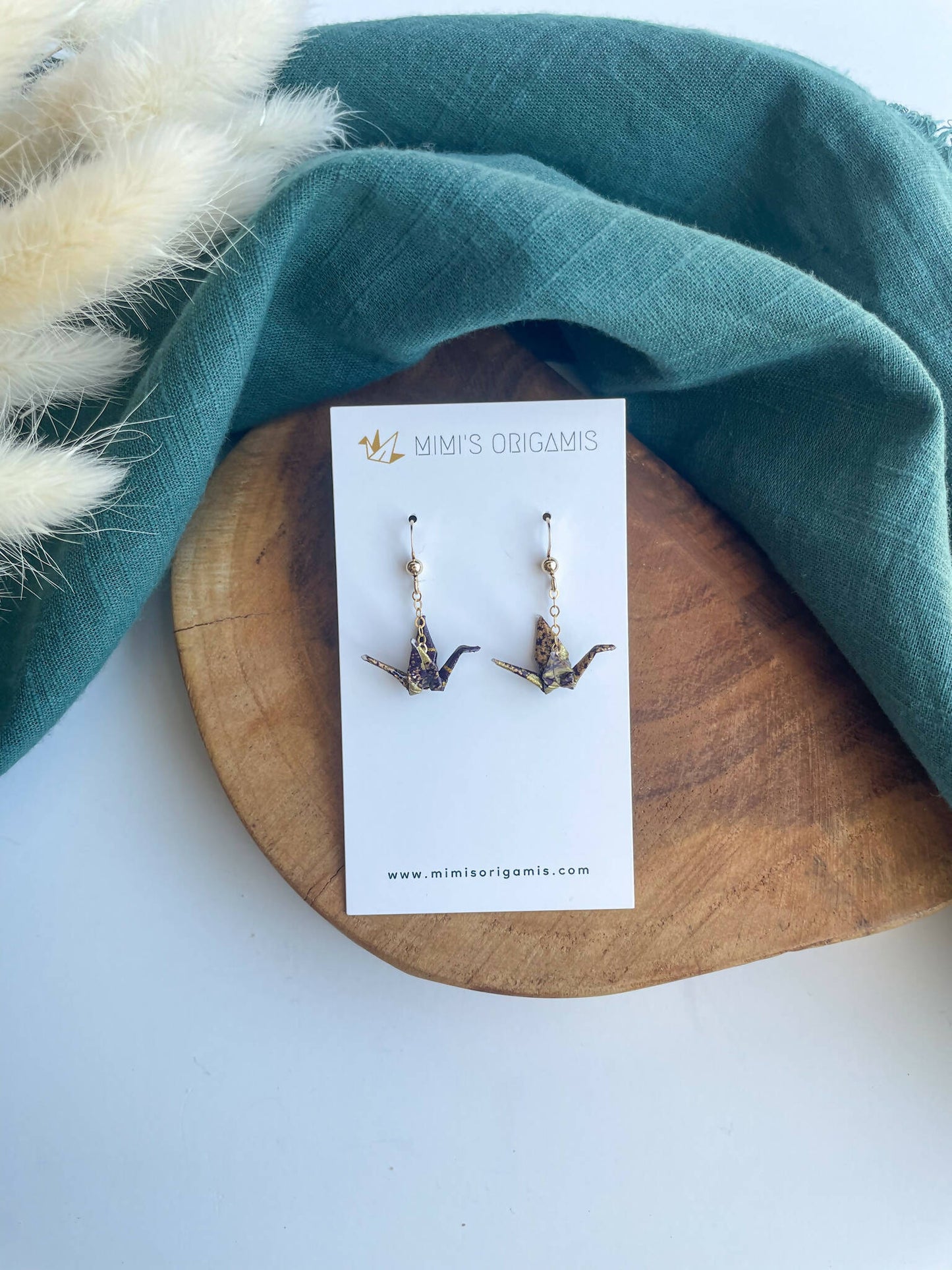 Tiny Dangling Cranes