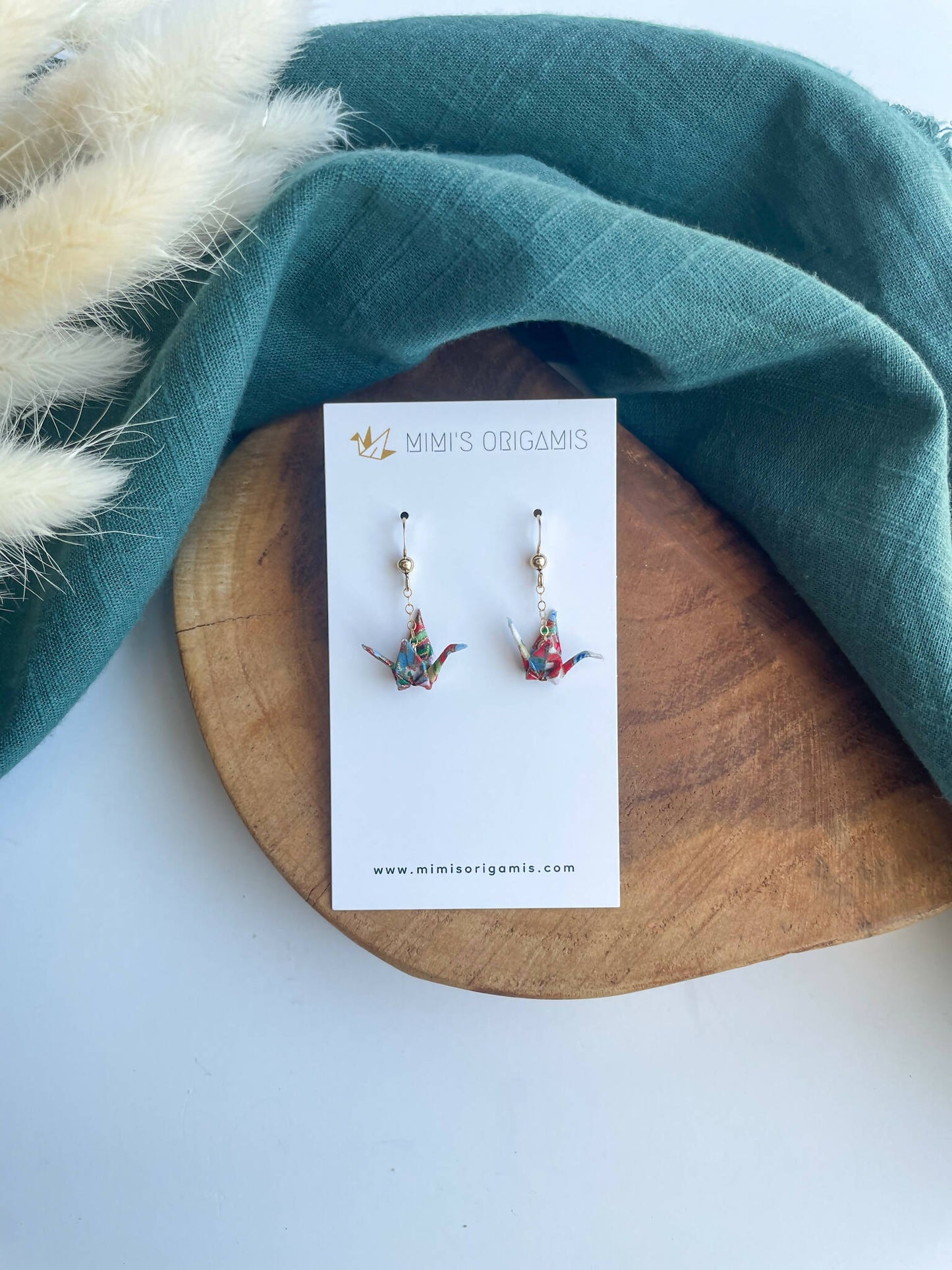 Tiny Dangling Cranes