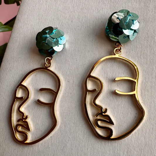 gold face dangle with a blue sequin post