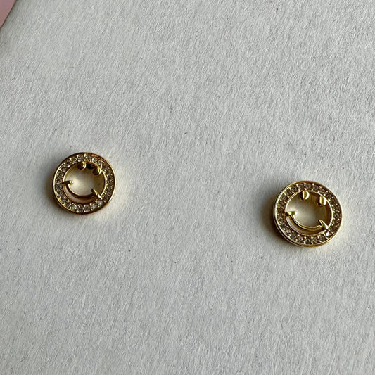 gold  and cubic zirconia smiley face studs 